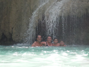 The family under a waterfall