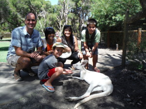 Petting kangaroos with new friends in Australia (whom we met in Laos)